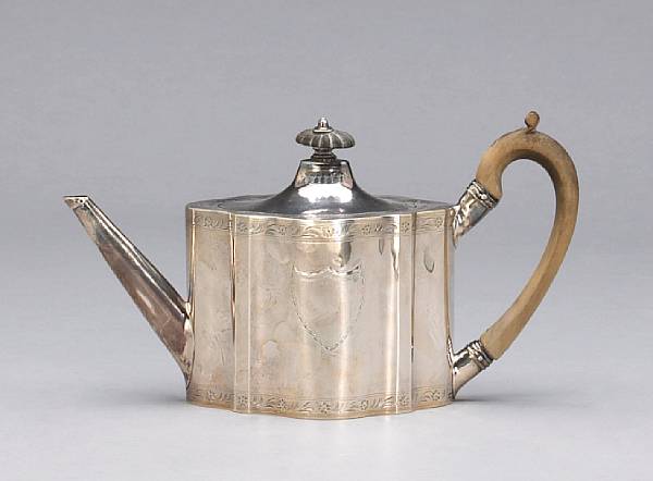 Appraisal: A George III silver and wood teapotGS overstriking another London