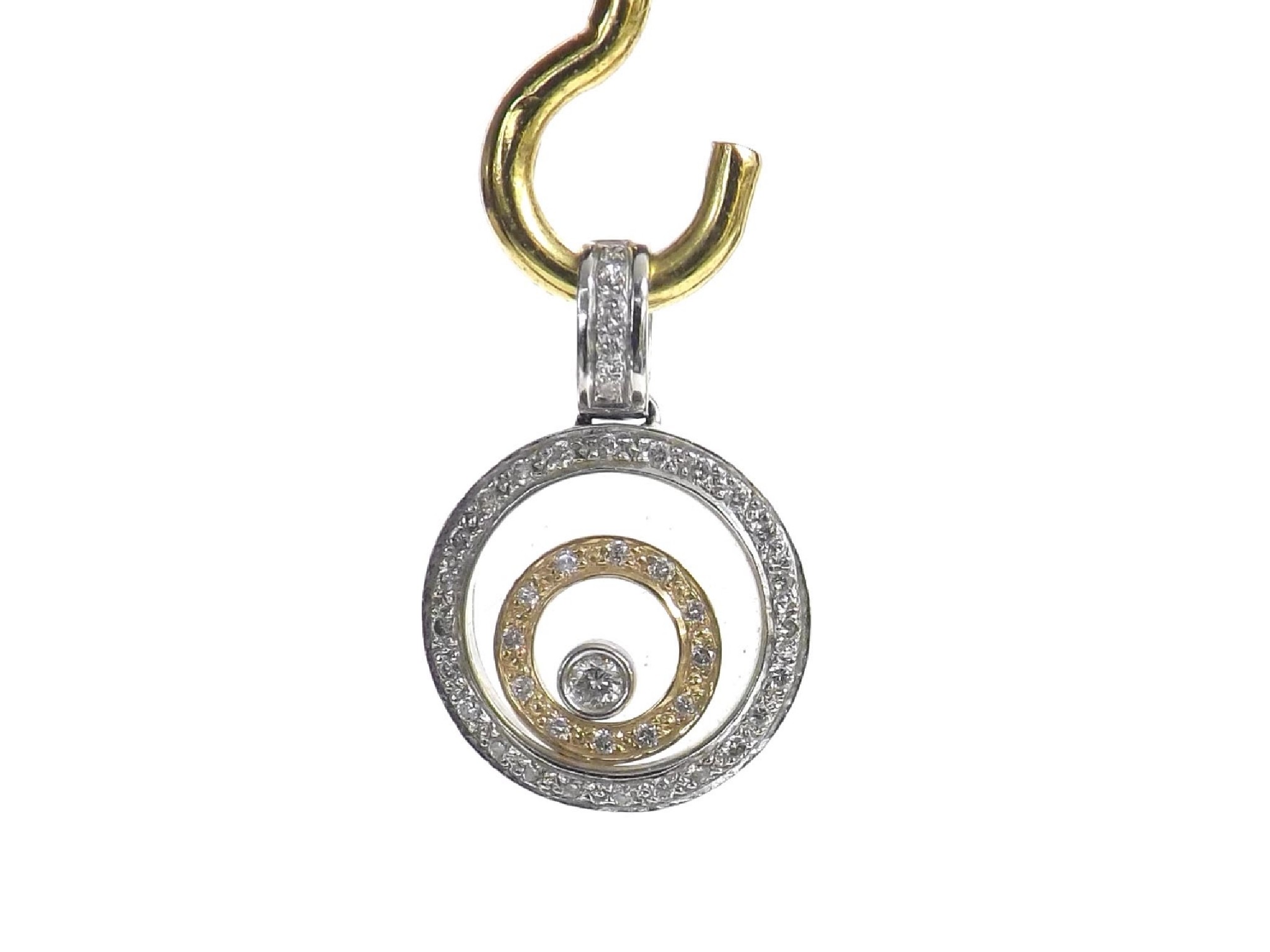 Appraisal: -c k diamond set two colour floating diamond pendant in