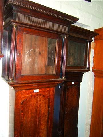 Appraisal: A Georgian oak cottage long case clock case the hood