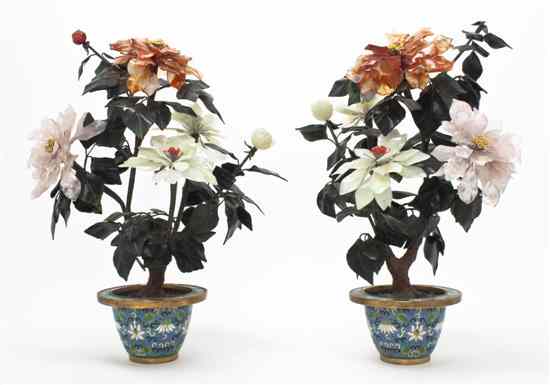 Appraisal: A Pair of Chinese Hardstone Models of Flowers depicting chrysanthemum