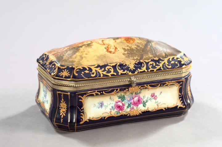 Appraisal: Large Continental Parcel-Gilt and Transfer Decorated Porcelain Jewel Casket the