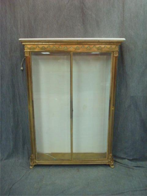 Appraisal: Bronze Door White Marbletop Vitrine Very fine quality raised on