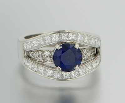 Appraisal: A Simon G Sapphire and Diamond Platinum Ring Platinum split