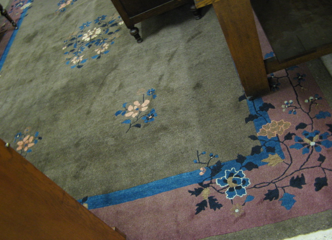 Appraisal: ART DECO CHINESE NICHOLS CARPET the plain taupe field and