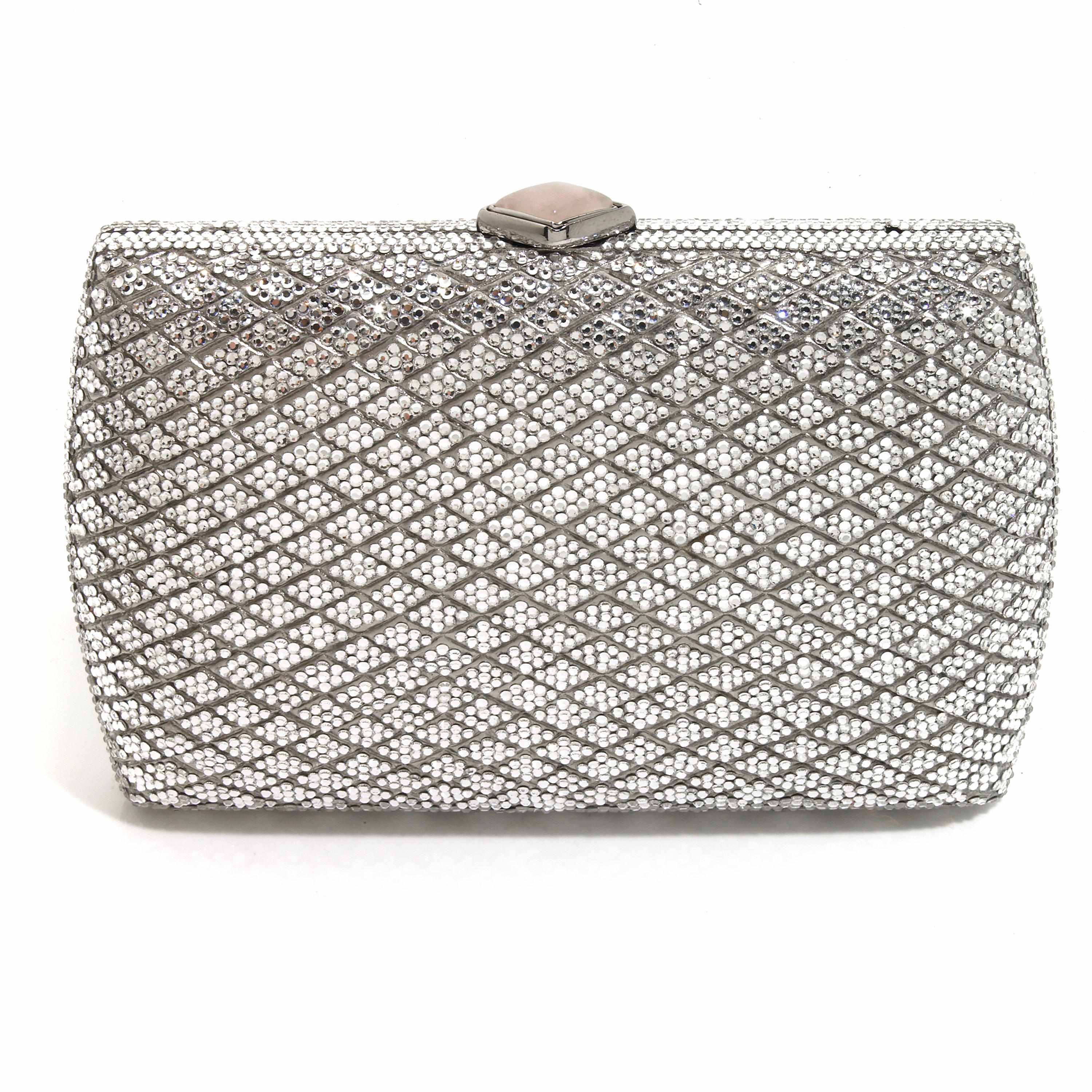 Appraisal: A silver crystal diamond patterned purse interior with a mirror