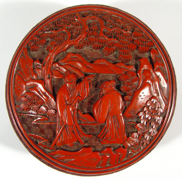 Appraisal: Oriental red lacquered bun shaped box the lid carved with