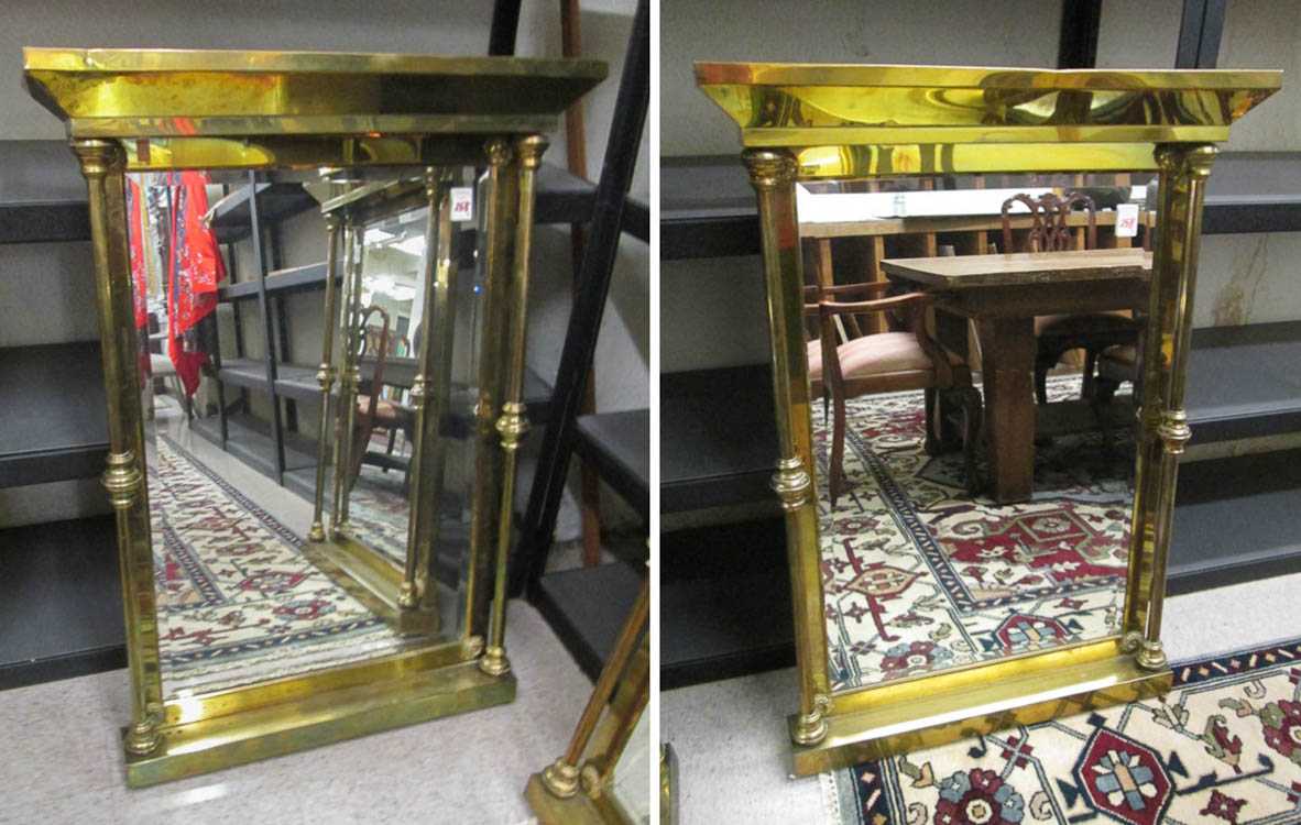 Appraisal: A PAIR OF VICTORIAN STYLE BRASS-FRAMED WALL MIRRORS American late