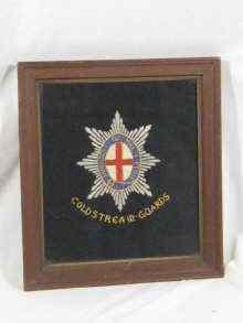 Appraisal: Four WW I hand embroidered insignia panels The Coldstream Guards