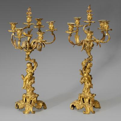 Appraisal: Pair gilt bronze candelabra rococo style each with putto seated