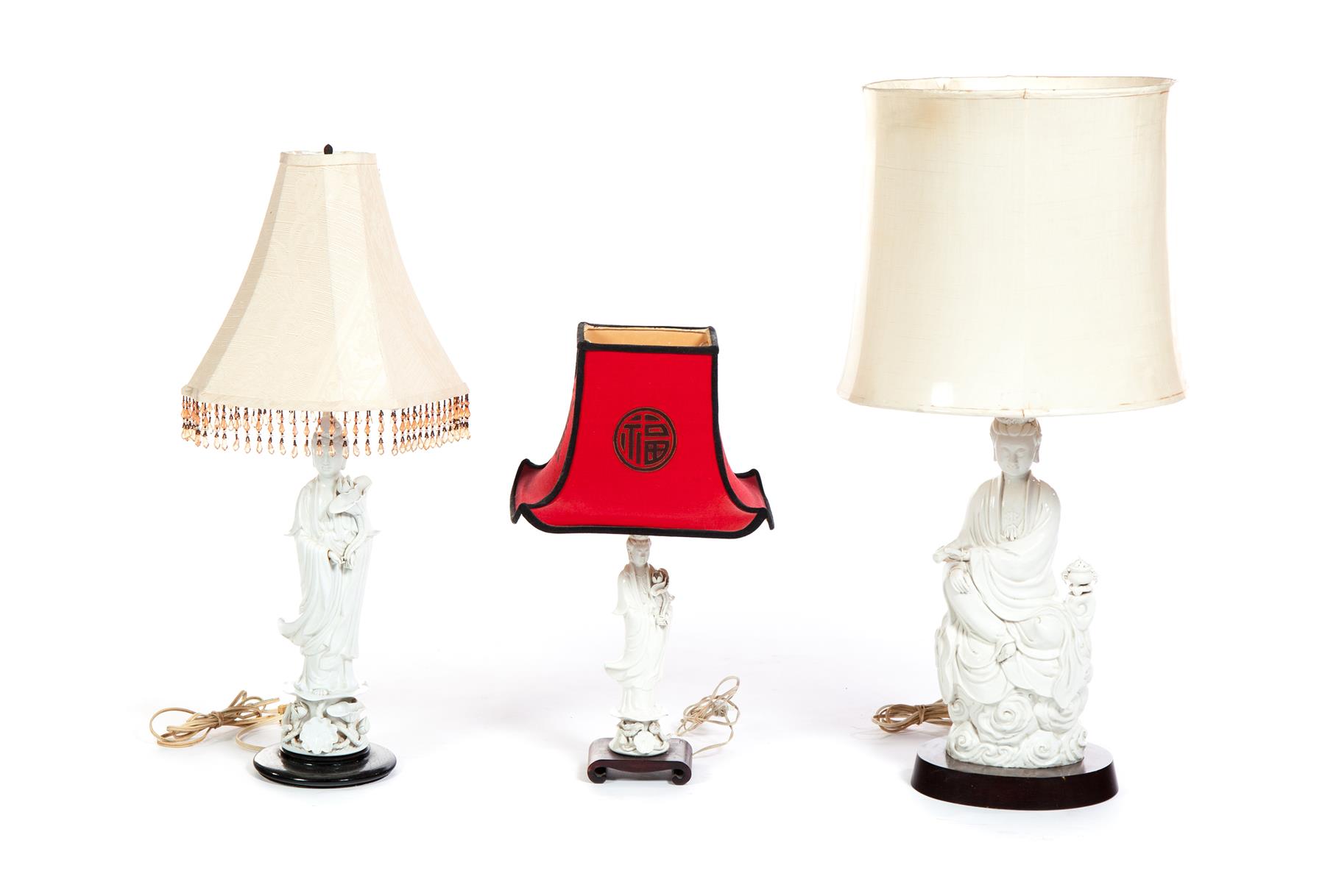 Appraisal: THREE CHINESE BLANC DE CHINE TABLE LAMPS Second half- th