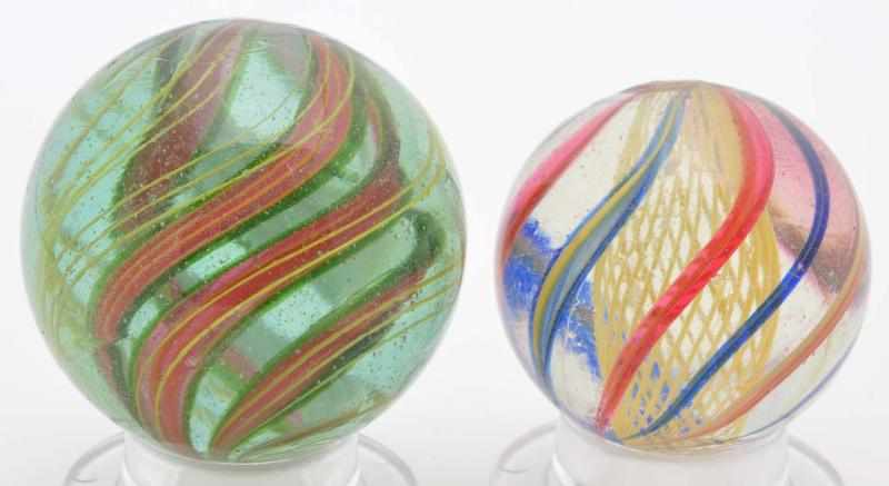 Appraisal: Lot of Swirl Marbles Description Both with original surfaces Condition