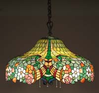 Appraisal: WILKENSON LEADED HANGER Spectacular Wilkenson hanger has intricate design of