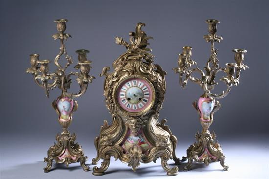 Appraisal: NAPOLEON III BRONZE-DOR AND S VRES-STYLE PORCELAIN CLOCK GARNITURE last