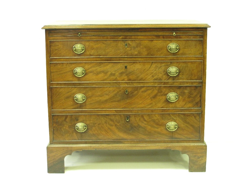 Appraisal: A George III mahogany Chest of four long graduated drawers