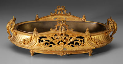 Appraisal: Oval gilt bronze footed planter openwork foliage with trophi