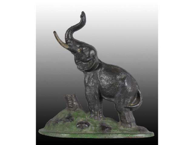 Appraisal: Elephant by Tree Stump Cast Iron Doorstop Description Made by