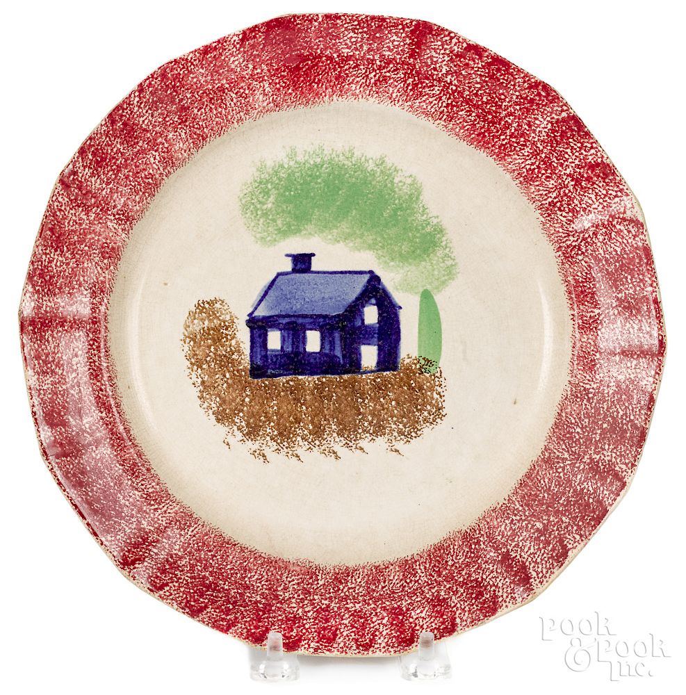 Appraisal: Red spatter plate Red spatter plate with blue schoolhouse dia