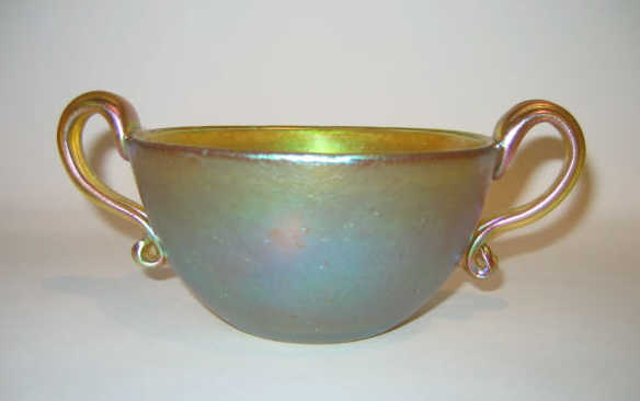 Appraisal: L C T FAVRILE Gold iridescent bowl with two applied