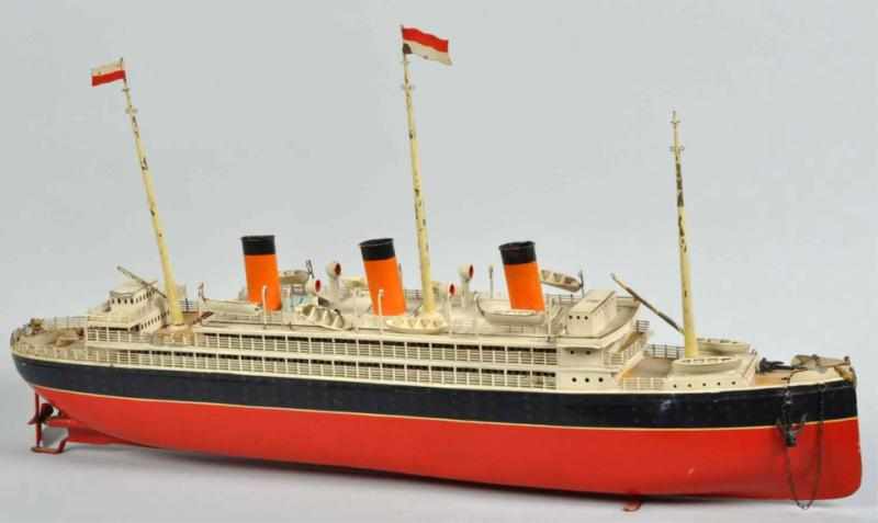 Appraisal: Handpainted Bing Clockwork Ocean Liner Toy Description German Three stack