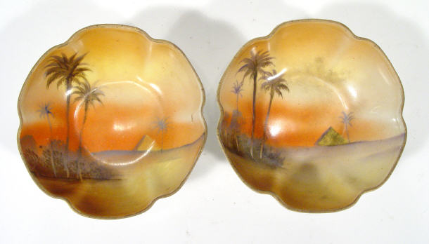 Appraisal: Two Noritake porcelain bonbon dishes painted with Egyptian landscape scenes