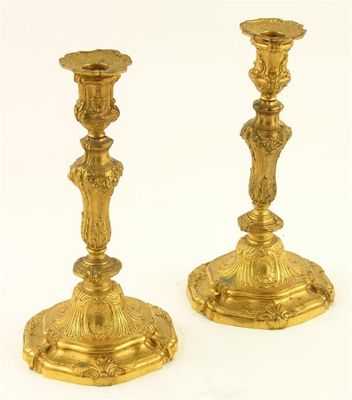 Appraisal: A pair of Louis XV style ormolu candlesticks by Henri