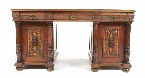 Appraisal: An American Renaissance Revival Style Pedestal Desk having a rectangular