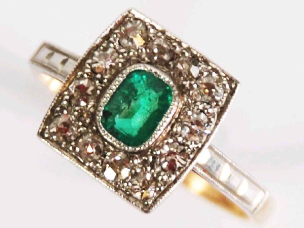 Appraisal: EARLY TWENTIETH CENTURY GOLD EMERALD AND DIAMOND OBLONG CLUSTER RING