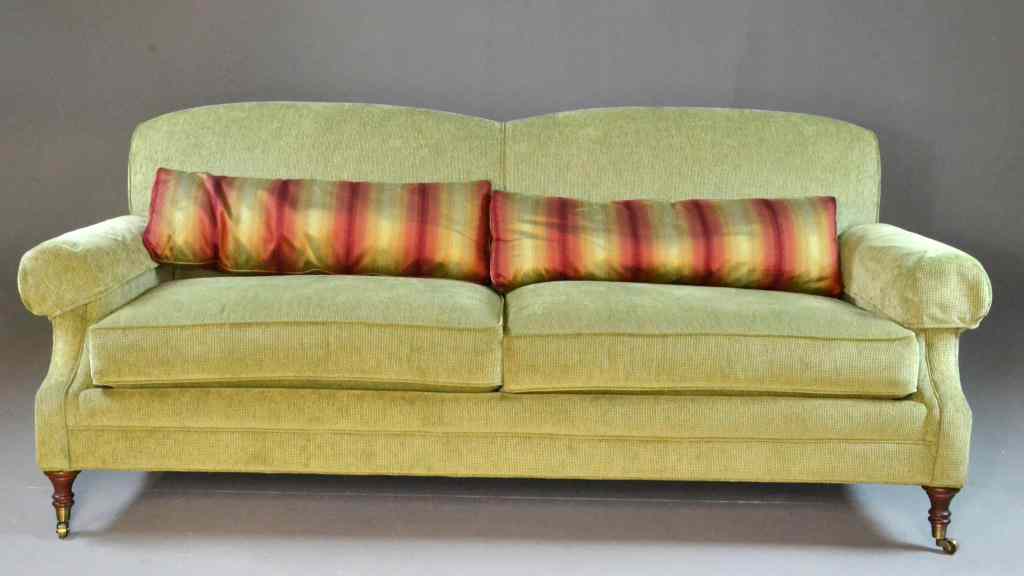 Appraisal: Green Chenille Couch with Striped PillowsContemporary sofa by C R