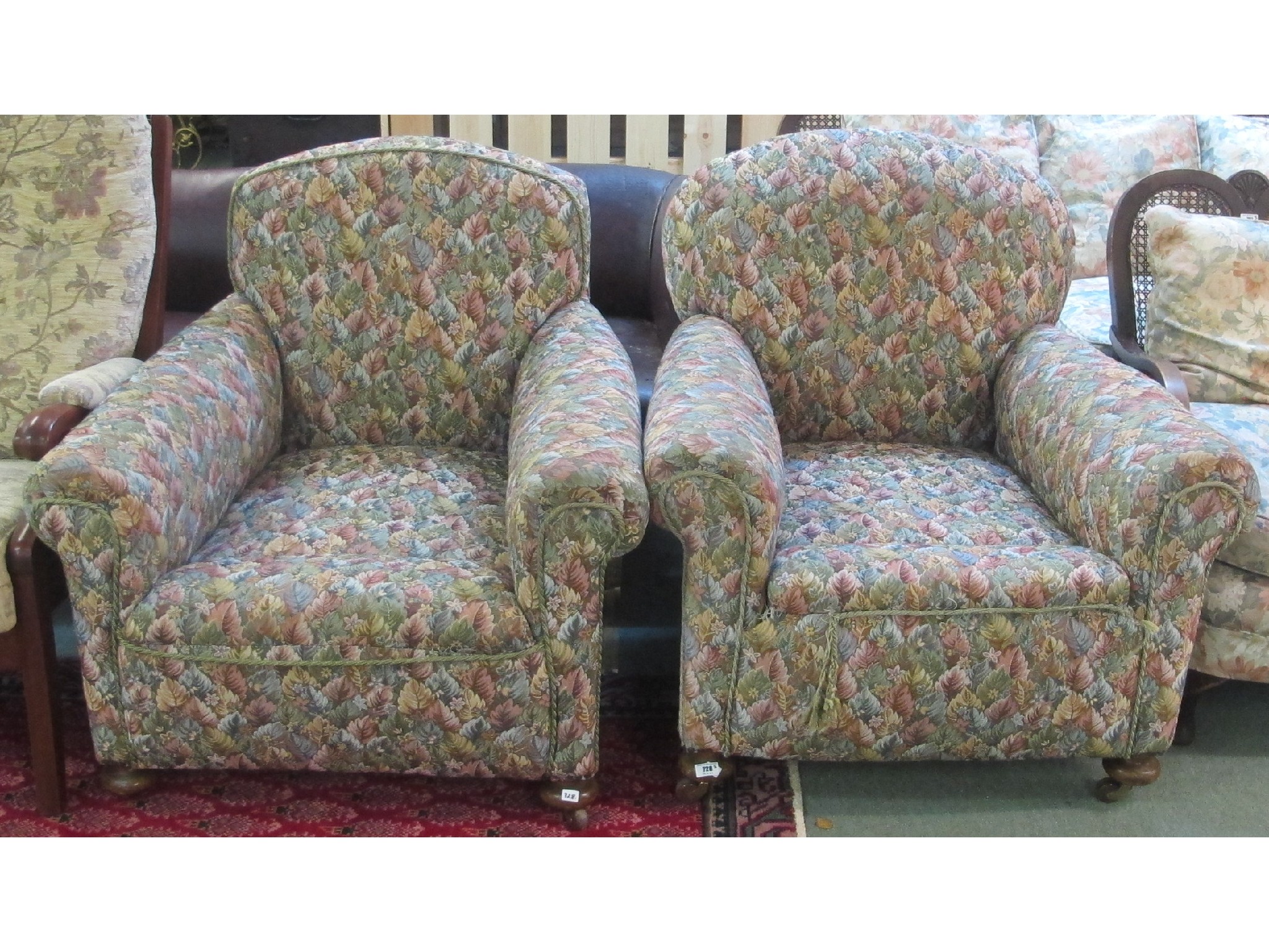 Appraisal: Two Victorian floral upholstered armchairs