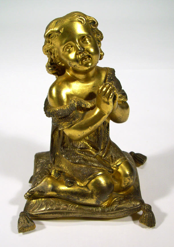 Appraisal: Victorian Ormolu figure of a child kneeling on a cushion