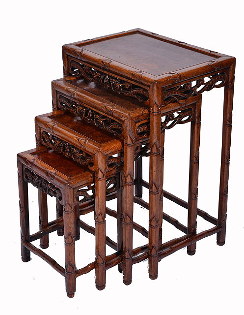 Appraisal: A SET OF FOUR CHINESE ELM TOPPED NESTING TABLES the