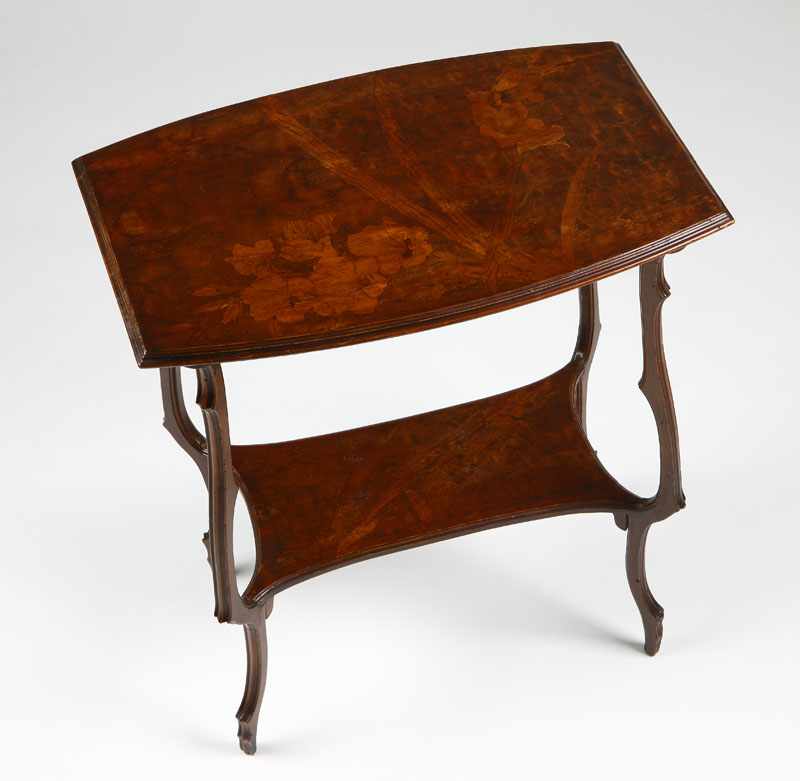 Appraisal: An Emile Galle beechwood and floral marquetry occasional table Circa