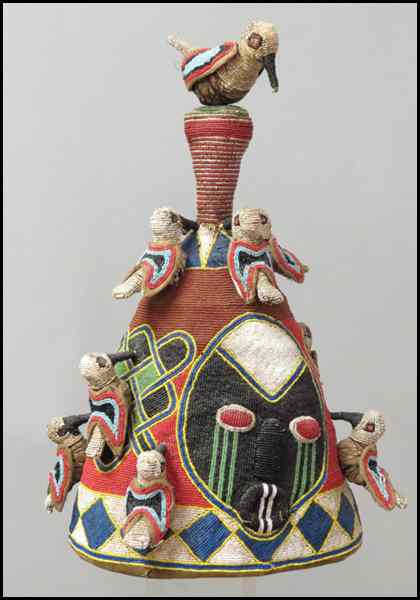 Appraisal: AFRICAN YORUBA BEADED HEADRESS CROWN Depicting masked faces with birds