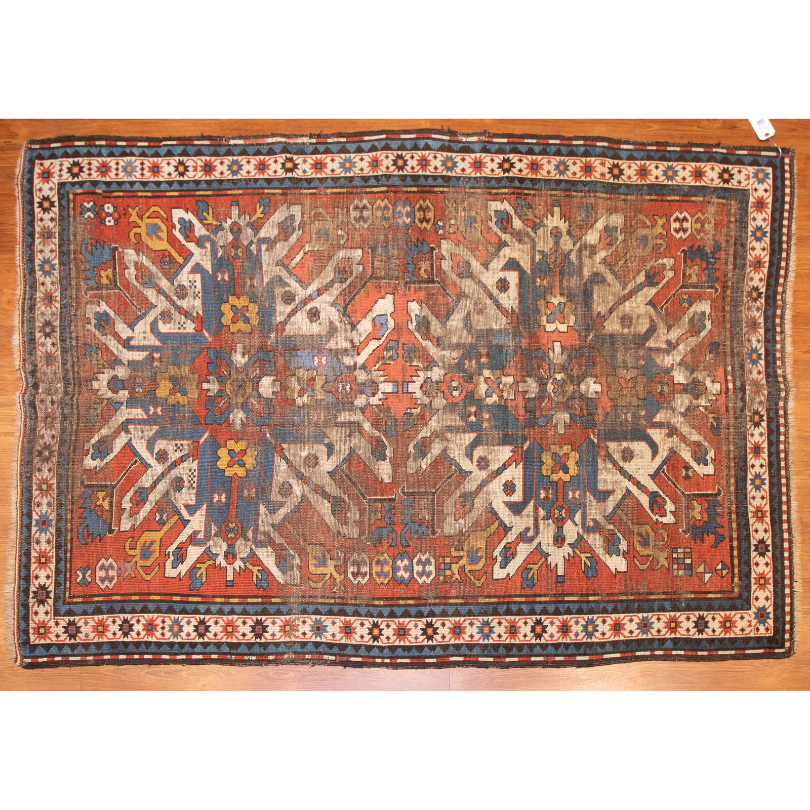 Appraisal: ANTIQUE EAGLE KAZAK RUG CAUCASUS X First quarter- th century-hand-knotted