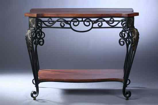 Appraisal: PAIR FRENCH STYLE CHERRY AND WROUGHT IRON SERPENTINE-FRONT CONSOLE TABLES