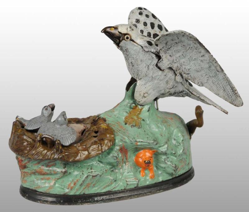 Appraisal: Cast Iron Eagle Eaglets Mechanical Bank Description Manufactured by J