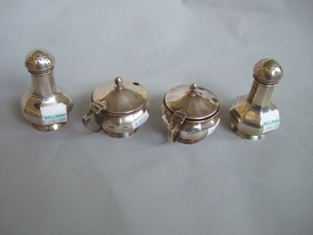 Appraisal: Silver condiments comprising a pair of mustard pots and a