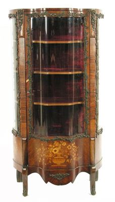 Appraisal: A late th century French rosewood and marquetry vitrine with