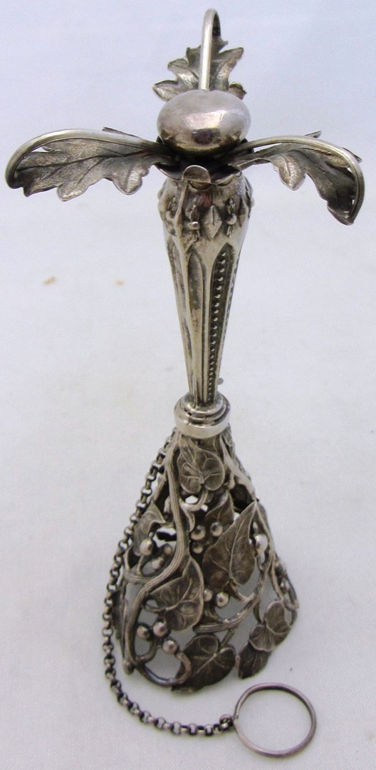 Appraisal: A posy holder of tapering form with pierced and embossed