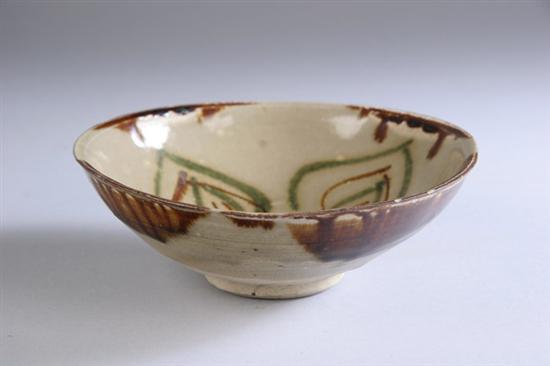 Appraisal: CHINESE CHANGSA STONEWARE BOWL Tang Dynasty th century Painted in