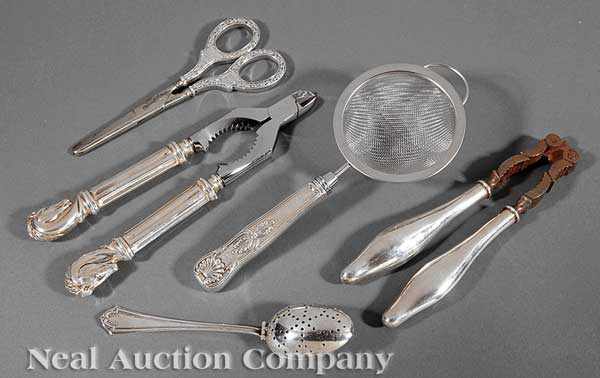 Appraisal: A Group of Silver Handled Nut Crackers Grape Shears and