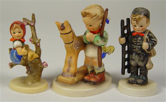 Appraisal: Three Hummel Figurines Boy with ladder girl in flowering tree