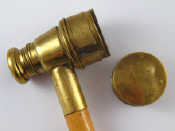 Appraisal: A malacca walking cane the head a brass extending spyglass