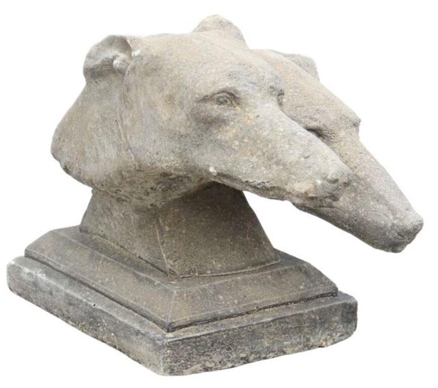 Appraisal: Cast stone garden statuary Dog Heads having two forward facing