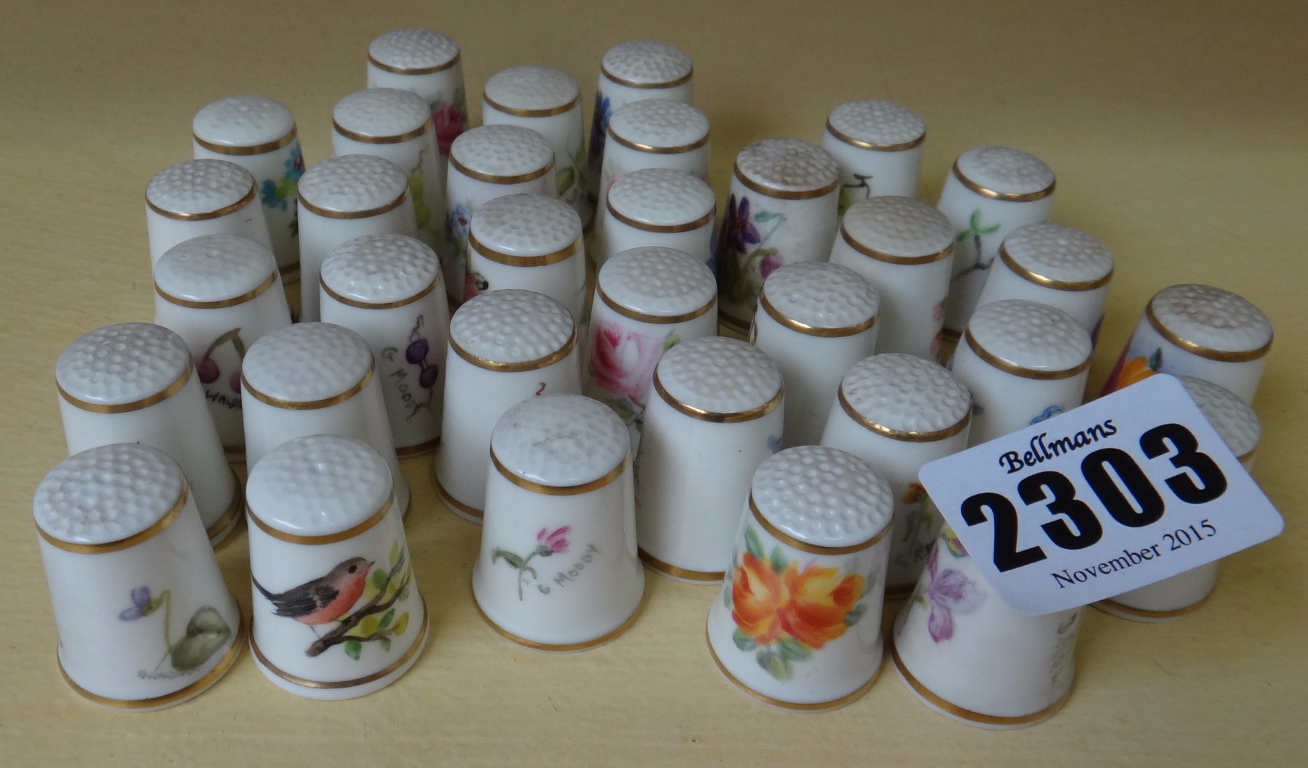 Appraisal: Thirty three Royal Worcester black printed factory mark porcelain thimbles