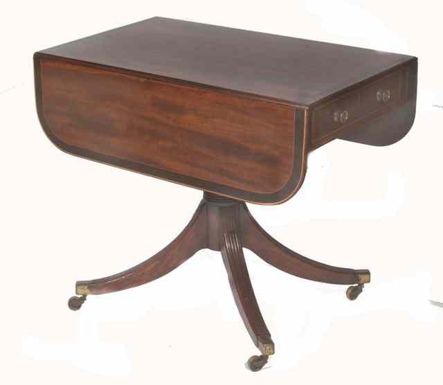 Appraisal: A GEORGIAN MAHOGANY PEMBROKE TABLE fitted with two fall-flaps with