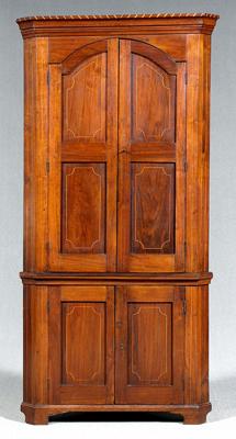 Appraisal: Tennessee walnut corner cupboard one piece construction with inlaid cornice