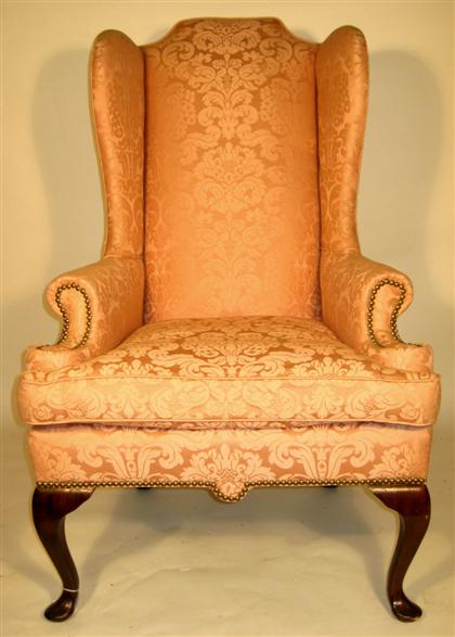 Appraisal: Pair of mahogany framed wing back armchairs H in W