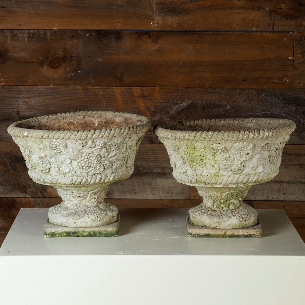 Appraisal: Near Pair of Foliate Decorated Cast Composition Urns x x