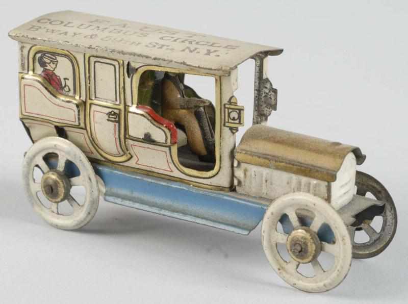 Appraisal: Tin Litho Advertising Automobile Penny Toy Description German Stamped Faust